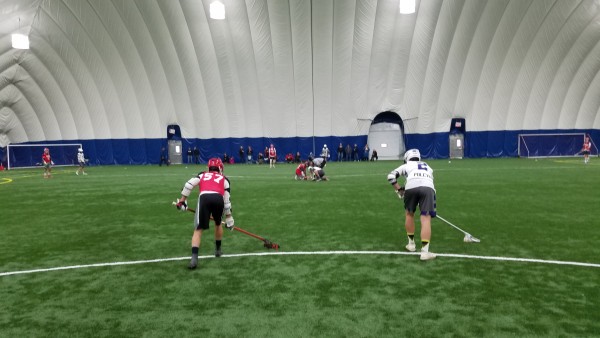 Players in an 8v8 Field Lacrosse league at High Velocity Sports
